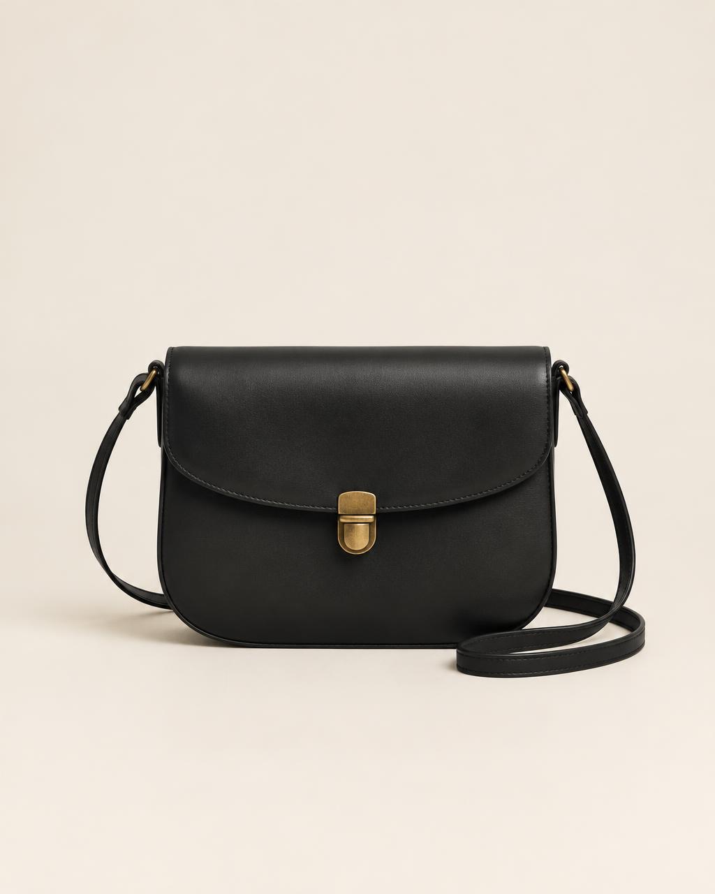 Sienne Crossbody — Saddle crossbody with brass clasp